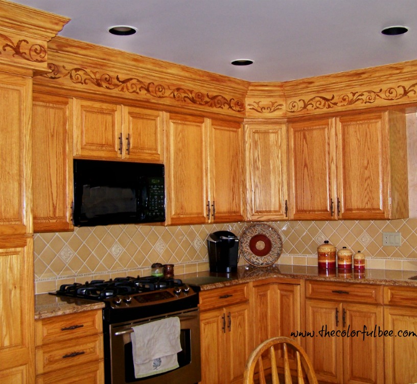 a creative way to disguise ugly kitchen soffits