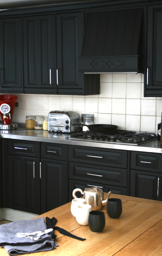 black cabinetry from Bodie and Fou
