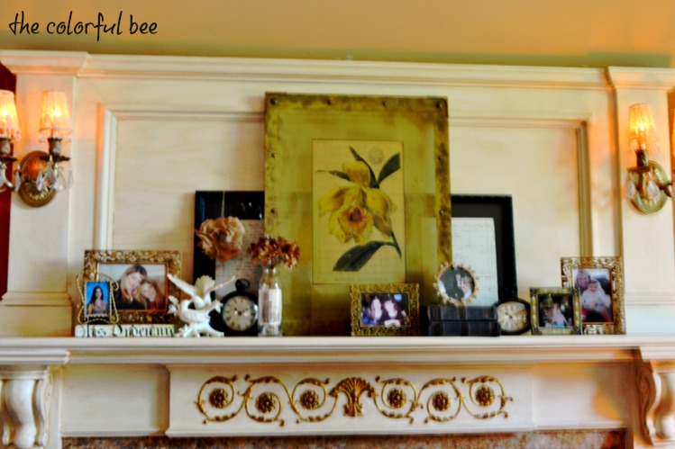 antiqued mantle with cherished family photos
