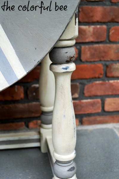 close up of distressed legs on a coffee table painted with Annie Sloan Chalk Paint