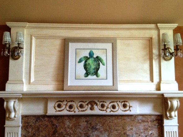 one piece of art as a focal point on the mantel