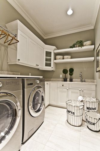 white laundry room with baskets 