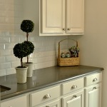 painted white laundry room cabinets